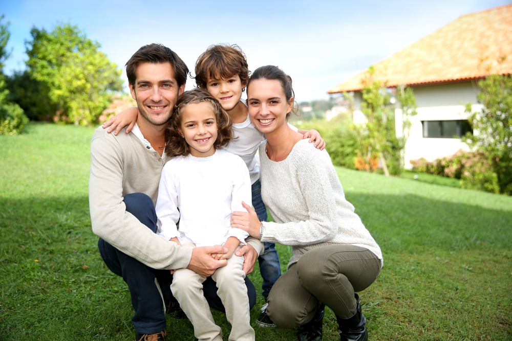 Cute family portrait of 4 people