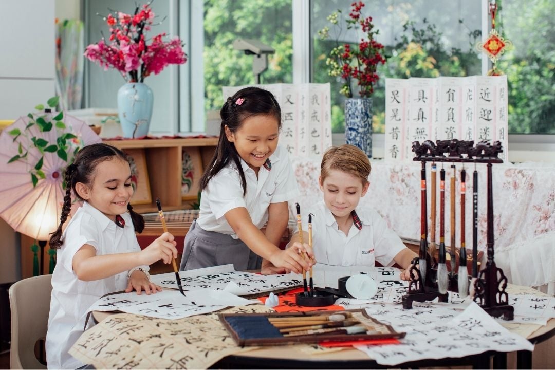 EtonHouse Broadrick students practising Chinese calligraphy as part of their Mandarin learning. EtonHouse Broadrick students practising Chinese calligraphy as part of their Mandarin learning.
